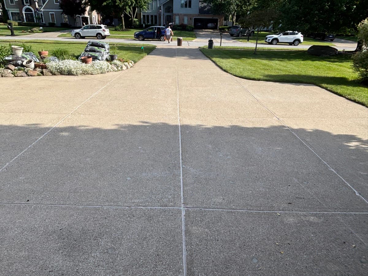 Completed driveway with caulked expansion joints