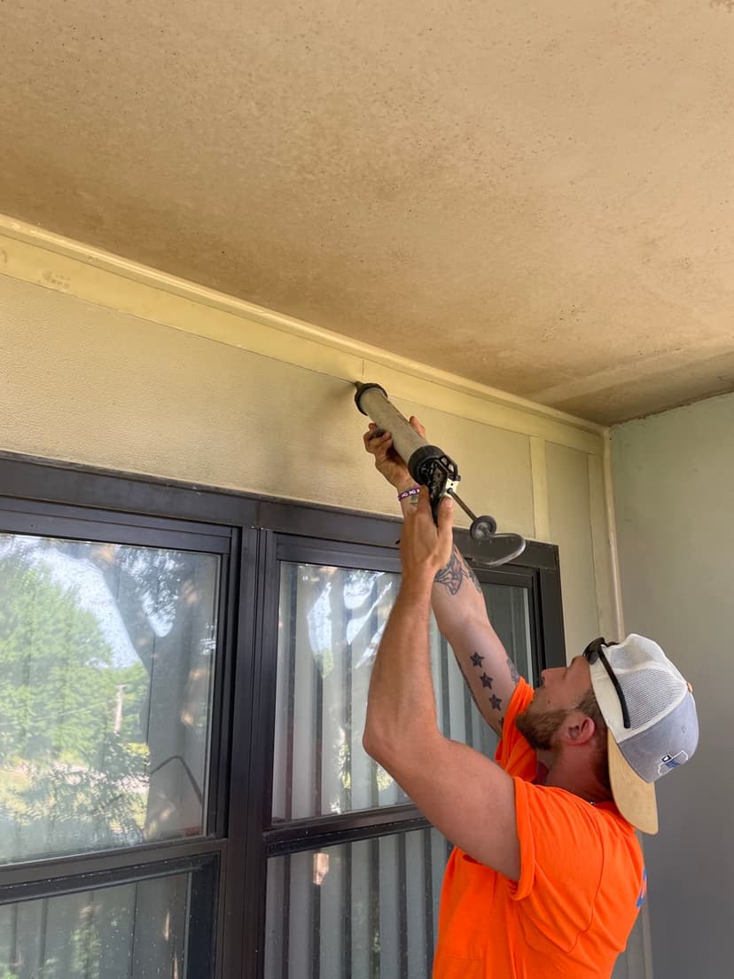 Caulking around window